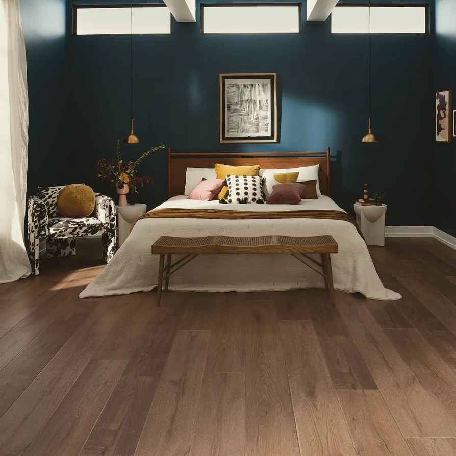 Easy-to-clean luxury vinyl flooring in a short-term rental guest bedroom